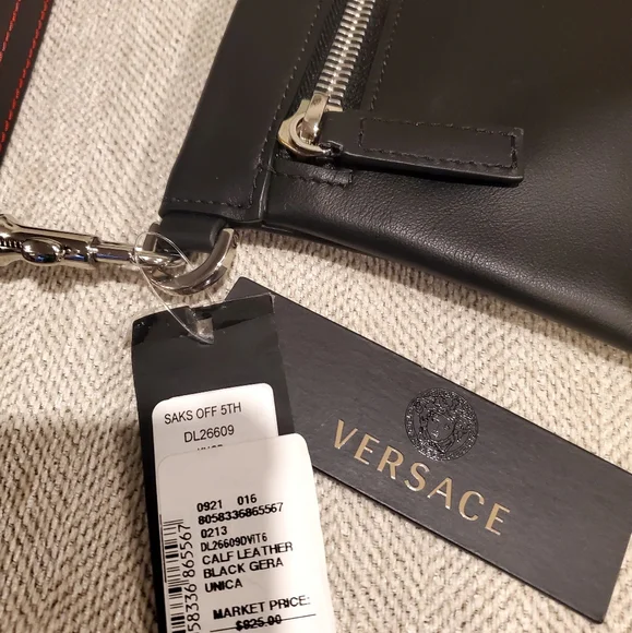 Brand new Versace leather clutch wrislet